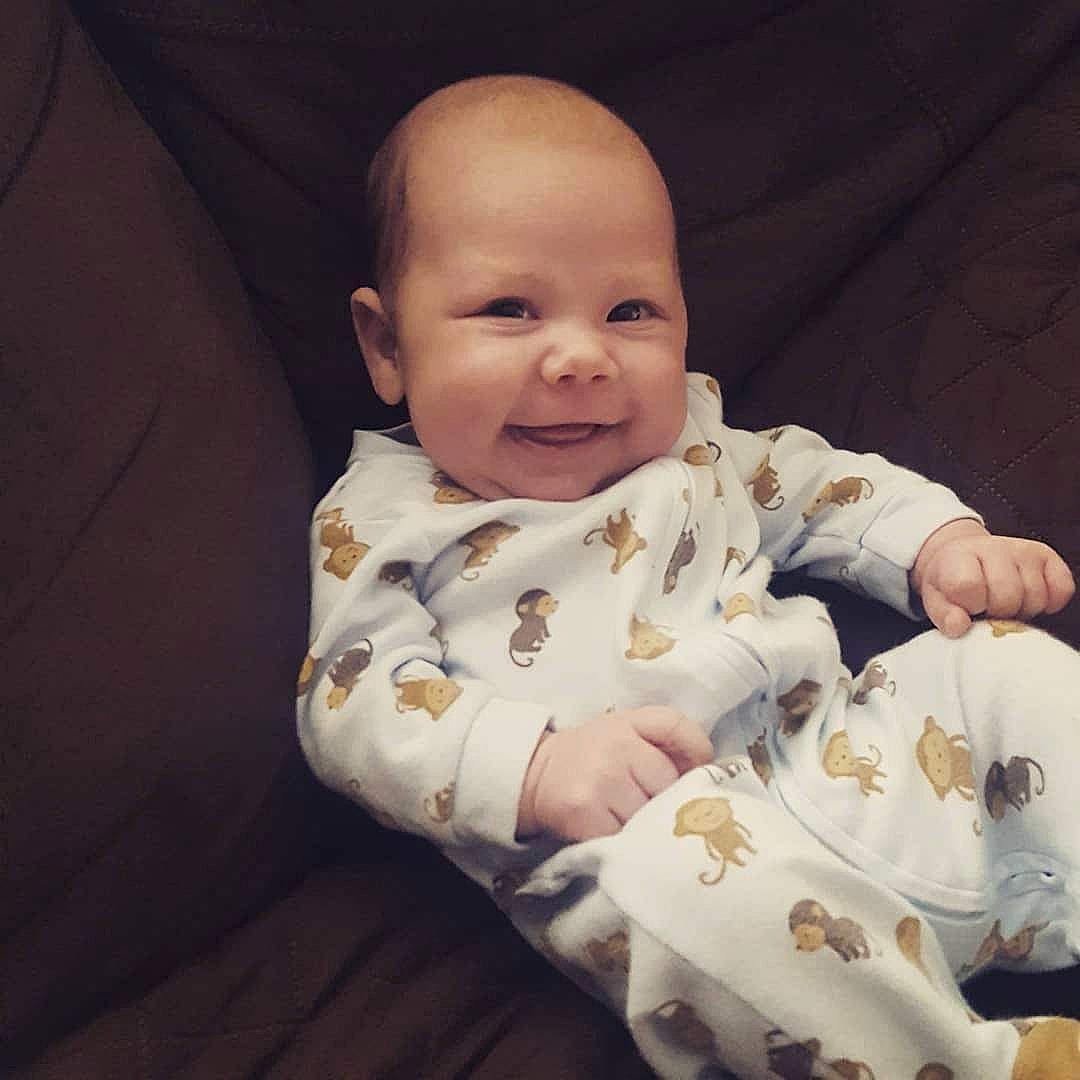 Lincoln joined the competition — help win amazing prizes! baby, baby_toddler_clothing, cheek, child, ear, eye, face, facial_expression, finger, happy, head, human, mouth, nose, person, sitting, skin, sleeve, smile, toddler