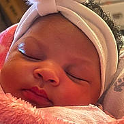 Eliana Stanford is registered to the contest to win money with this photo: baby, sleeping, blanket, headband, closeup, soft, cozy, infant, face, peaceful, cute, newborn, pink, warm, wrapped, adorable, child, portrait, resting, indoor