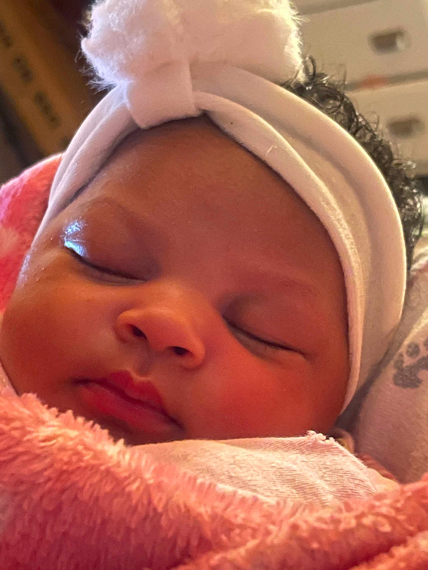 Eliana Stanford is registered to the contest to win money with this photo: baby, sleeping, blanket, headband, closeup, soft, cozy, infant, face, peaceful, cute, newborn, pink, warm, wrapped, adorable, child, portrait, resting, indoor