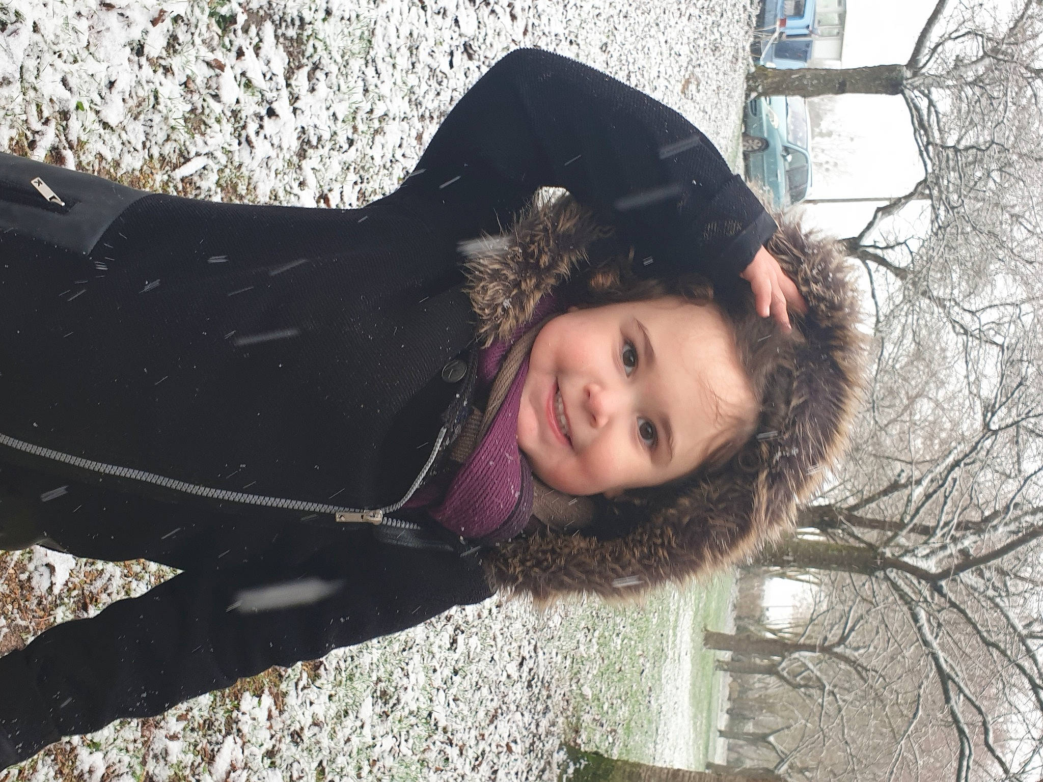 Hannah a rejoint le concours — aidez-le/la à gagner de superbes lots ! black_hair, child, flash_photography, freezing, fun, grass, happy, joy, leaf, leisure, long_hair, pattern, people_in_nature, person, portrait_photography, smile, snow, street_fashion, tints_and_shades, tree