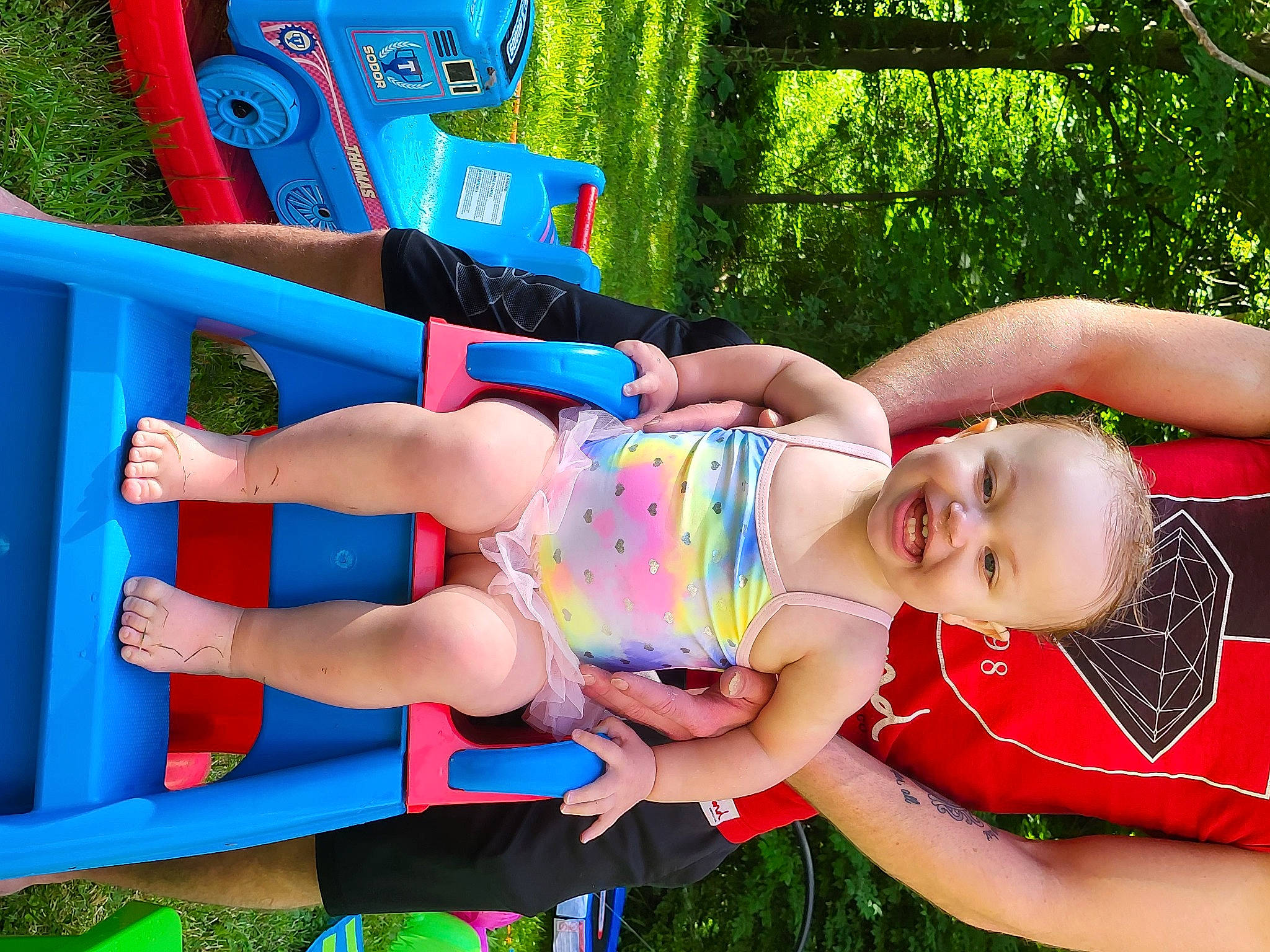 Emmy joined the competition — help win amazing prizes! blue, fun, grass, green, hand, happy, human_leg, joy, leg, leisure, people_in_nature, person, pink, plant, public_space, recreation, shorts, smile, summer, thigh