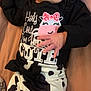 baby, infant, child, cow_print, headband, black_and_white, clothing, cute, sleeping, lying_down, hand, face, apparel, soft_surface, pink_background, newborn, adorable, resting, person, toddler