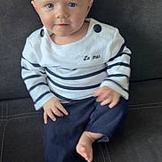 Raphaël a rejoint le concours — aidez-le/la à gagner de superbes lots ! baby, infant, child, blue_eyes, sailor_hat, striped_shirt, navy_pants, barefoot, sitting, couch, sofa, upholstery, buttons, stitching, hand, foot, portrait, indoor, cute, smile