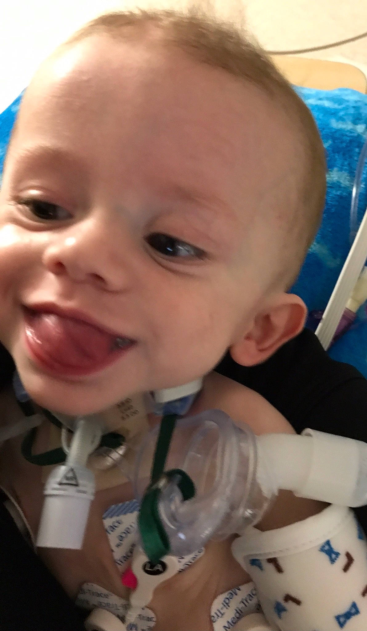 Kash is registered to the contest to win money with this photo: baby, blue, cheek, chin, ear, eye, eyebrow, eyelash, finger, gesture, happy, iris, jaw, lip, mouth, nose, person, skin, smile, tongue