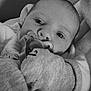 éléa participe au concours pour gagner de l'argent avec cette photo : baby, infant, pacifier, mittens, closeup, black_and_white, face, sleepwear, cute, portrait, child, newborn, soft, cozy, hand, expression, indoors, warm, comfort, young