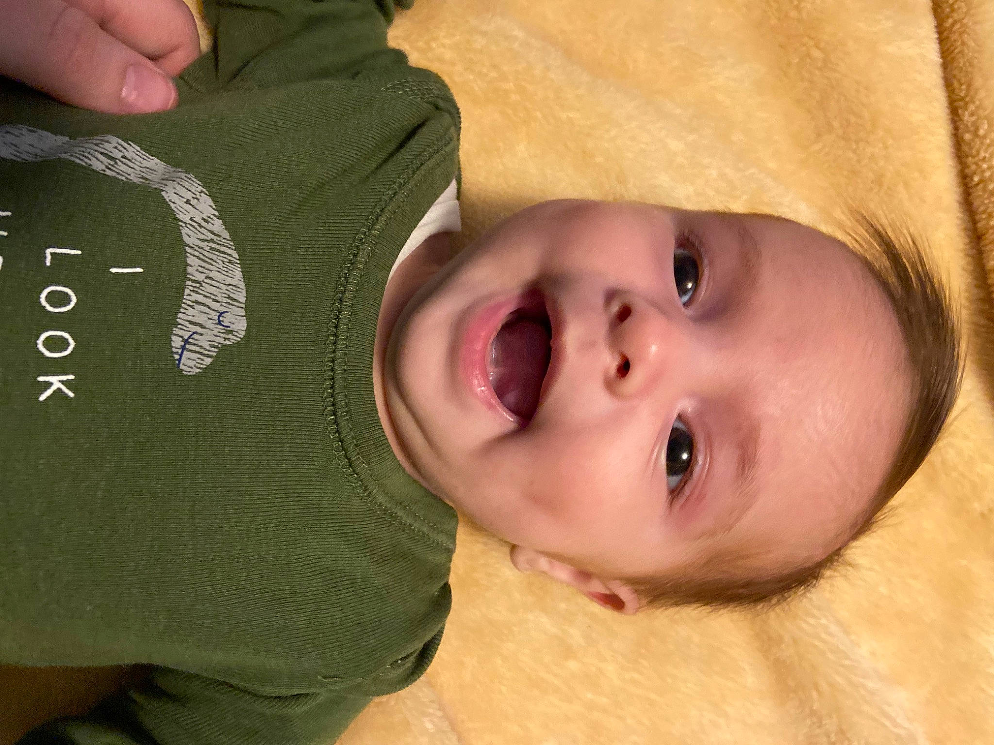 Evie is registered to the contest to win money with this photo: baby, cheek, chin, eye, eyelash, face, facial_expression, finger, gesture, hand, headgear, human, lip, mammal, mouth, neck, nose, person, product, skin