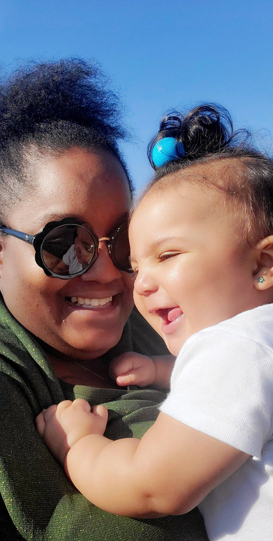 Amyla joined the competition — help win amazing prizes! baby, black_hair, cheek, child, cool, eyewear, forehead, fun, gesture, glasses, happy, interaction, joy, love, nose, person, smile, sunglasses, toddler, vision_care