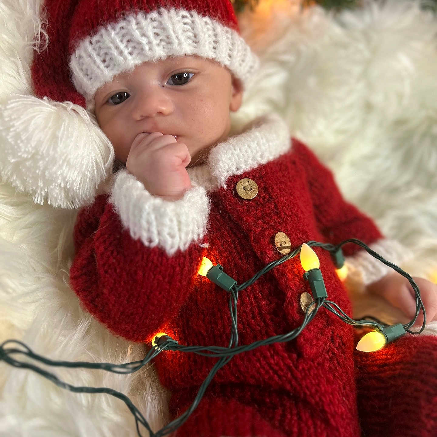 Alastair joined the competition — help win amazing prizes! baby, beanie, bodypart, bonnet, cap, clothing, coat, face, finger, glove, hand, hat, head, hood, jacket, knitwear, person, photography, portrait, sweater