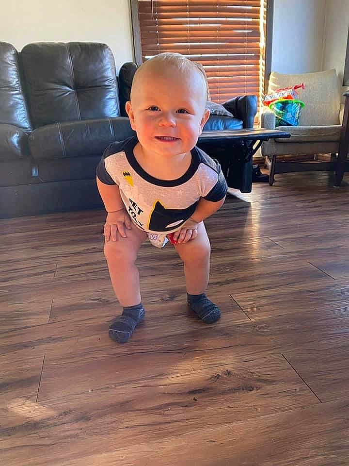 Jesse joined the competition — help win amazing prizes! baby, baby_toddler_clothing, child, couch, floor, flooring, furniture, hardwood, home, interior_design, joy, laminate_flooring, living_room, person, room, shoe, t_shirt, toddler, window_covering, window_treatment