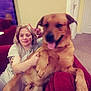 Tank joined the competition — help win amazing prizes! dog, person, couch, indoor, carpet, door, peace_sign, smiling, blonde_hair, tattoo, relaxed, pet, happy, furniture, living_room, wall, casual, friendly, tongue_out, seated