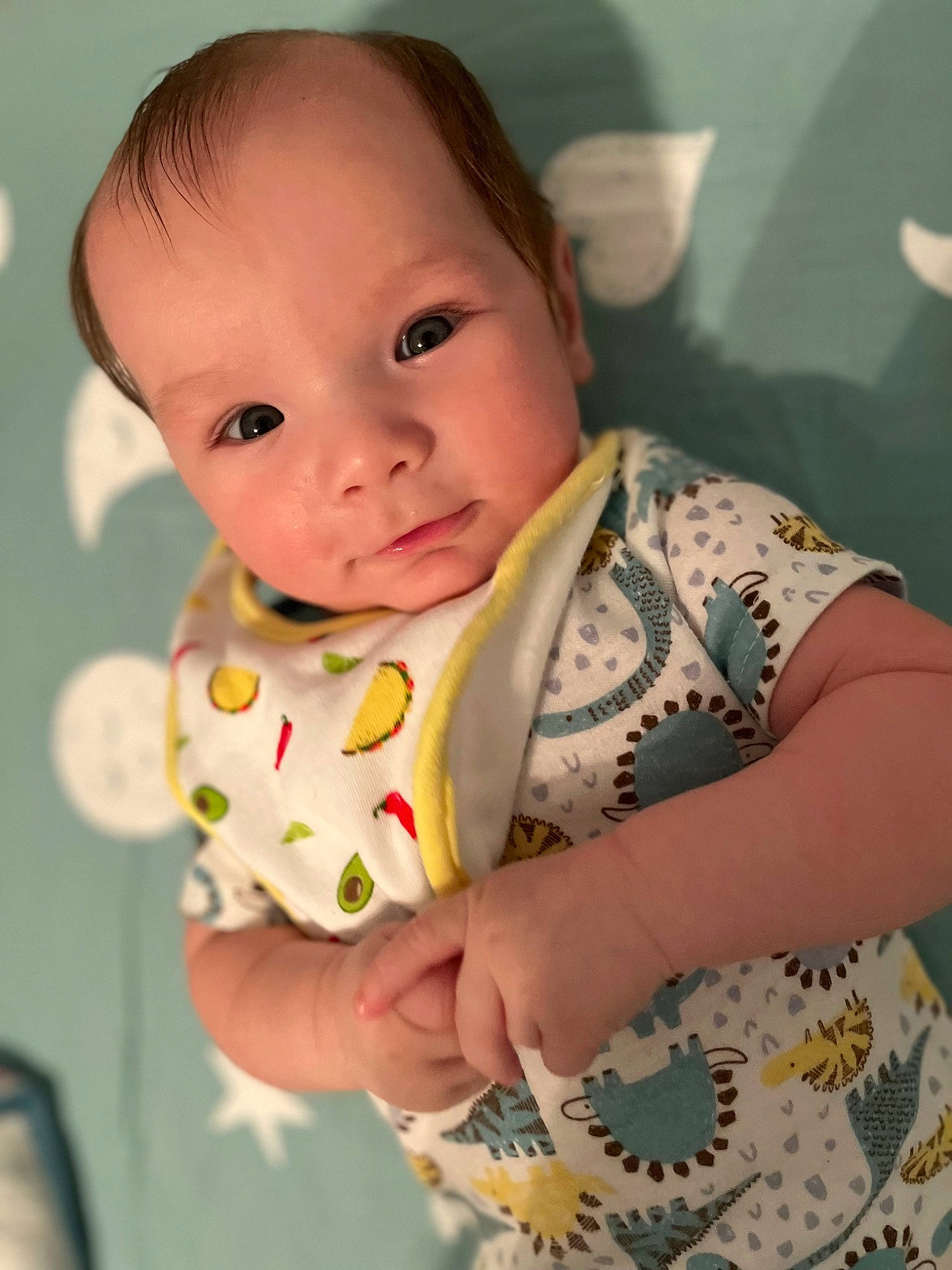 Devrim is registered to the contest to win money with this photo: arm, baby, baby_toddler_clothing, cheek, chin, comfort, dress, eye, eyebrow, eyelash, happy, iris, linens, lip, mouth, neck, nose, person, skin, sleeve