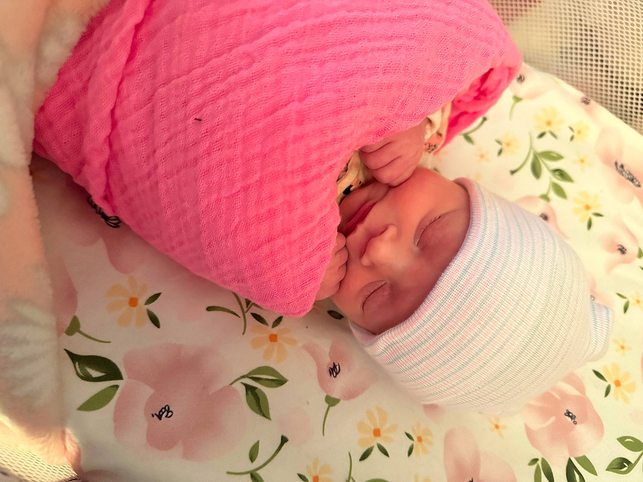 Victoria is registered to the contest to win money with this photo: baby, baby_products, baby_sleeping, baby_toddler_clothing, bedtime, child, comfort, face, finger, hand, head, headgear, headwear, linens, mouth, pattern, person, pink, skin, textile