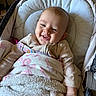 Madalynn joined the competition — help win amazing prizes! baby, infant, child, smiling, happy, portrait, face, sitting, baby_seat, car_seat, blanket, patterned_fabric, clothing, indoor, cozy, white_blanket, colorful_strap, head, hands, photography