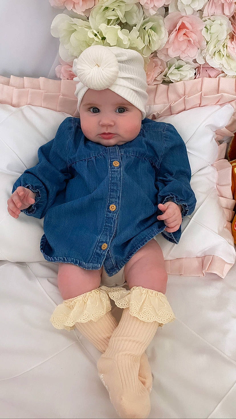 Cathy joined the competition — help win amazing prizes! arm, baby, baby_toddler_clothing, doll, embellishment, eye, fashion_design, headgear, headwear, iris, linens, pattern, person, pink, skin, sleeve, sock, textile, thigh, toddler