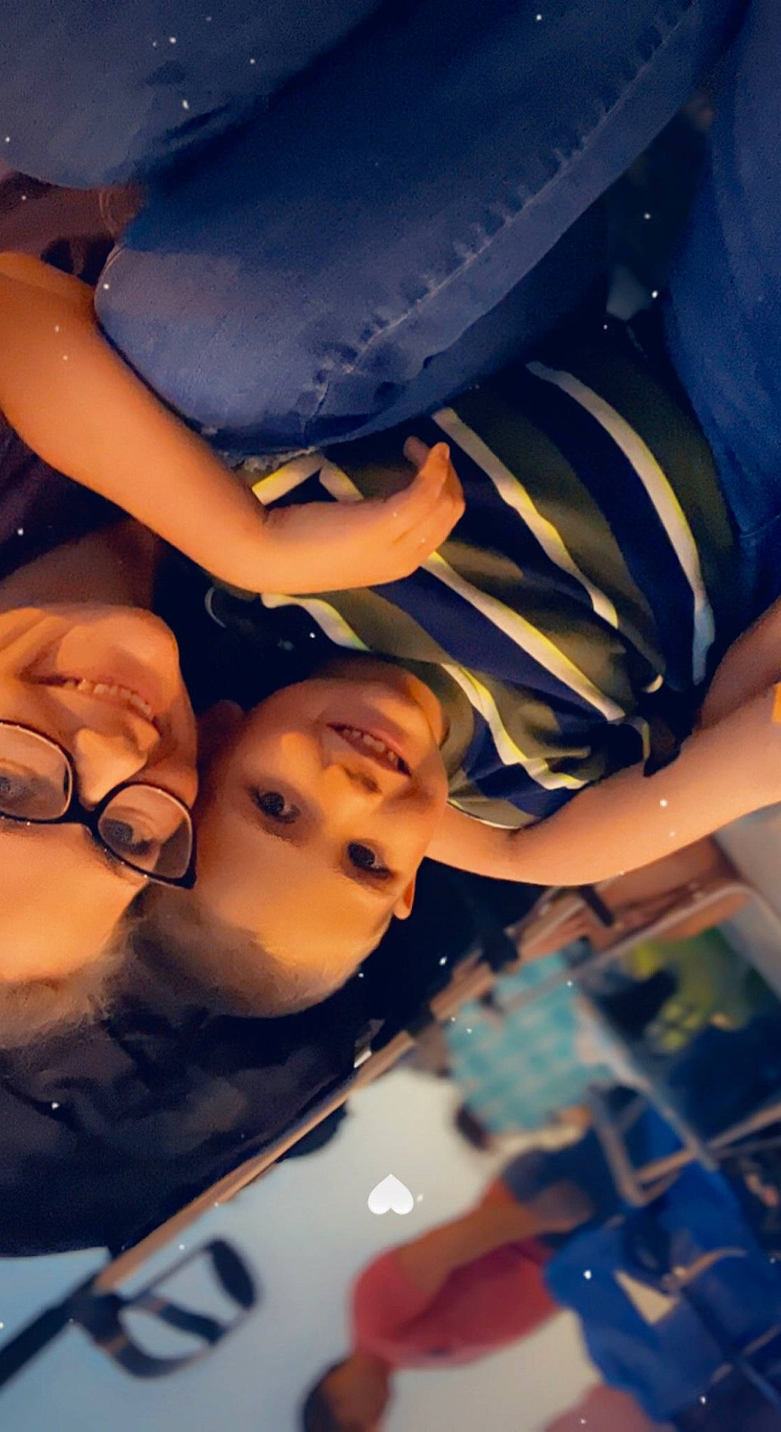 Joseph is registered to the contest to win money with this photo: black_hair, blue, chest, child, cool, electric_blue, event, eyelash, eyewear, finger, flash_photography, fun, gesture, joy, leisure, mouth, pattern, person, reflection, room