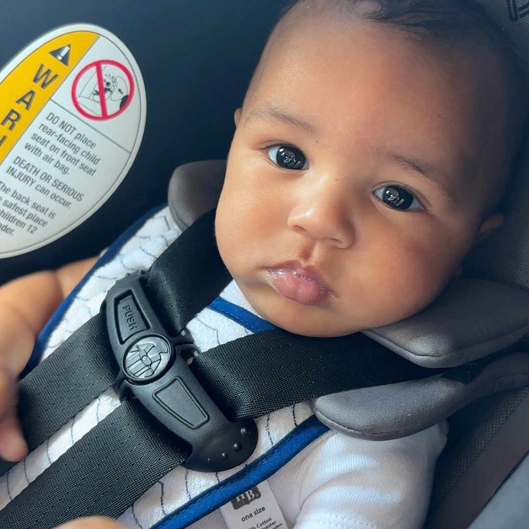 Kayden joined the competition — help win amazing prizes! accessories, baby, belt, bodypart, car, car_interior, carseat, cushion, face, finger, hand, head, homedecor, person, photography, portrait, seatbelt, strap, transportation, vehicle