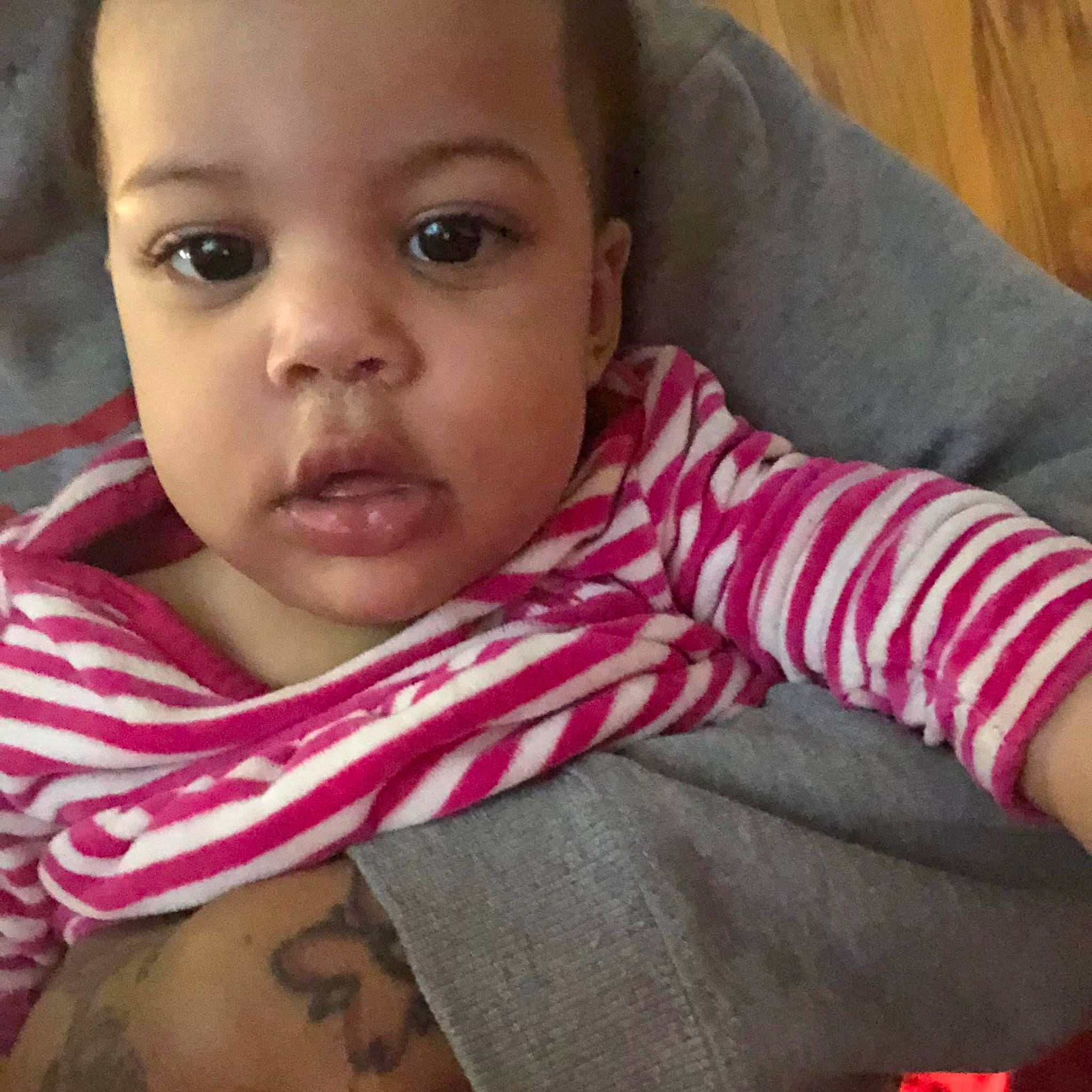 Maria is registered to the contest to win money with this photo: baby, baby_toddler_clothing, cheek, chin, comfort, cool, eyelash, facial_expression, forehead, happy, head, iris, lip, mouth, neck, nose, person, skin, sleeve, smile