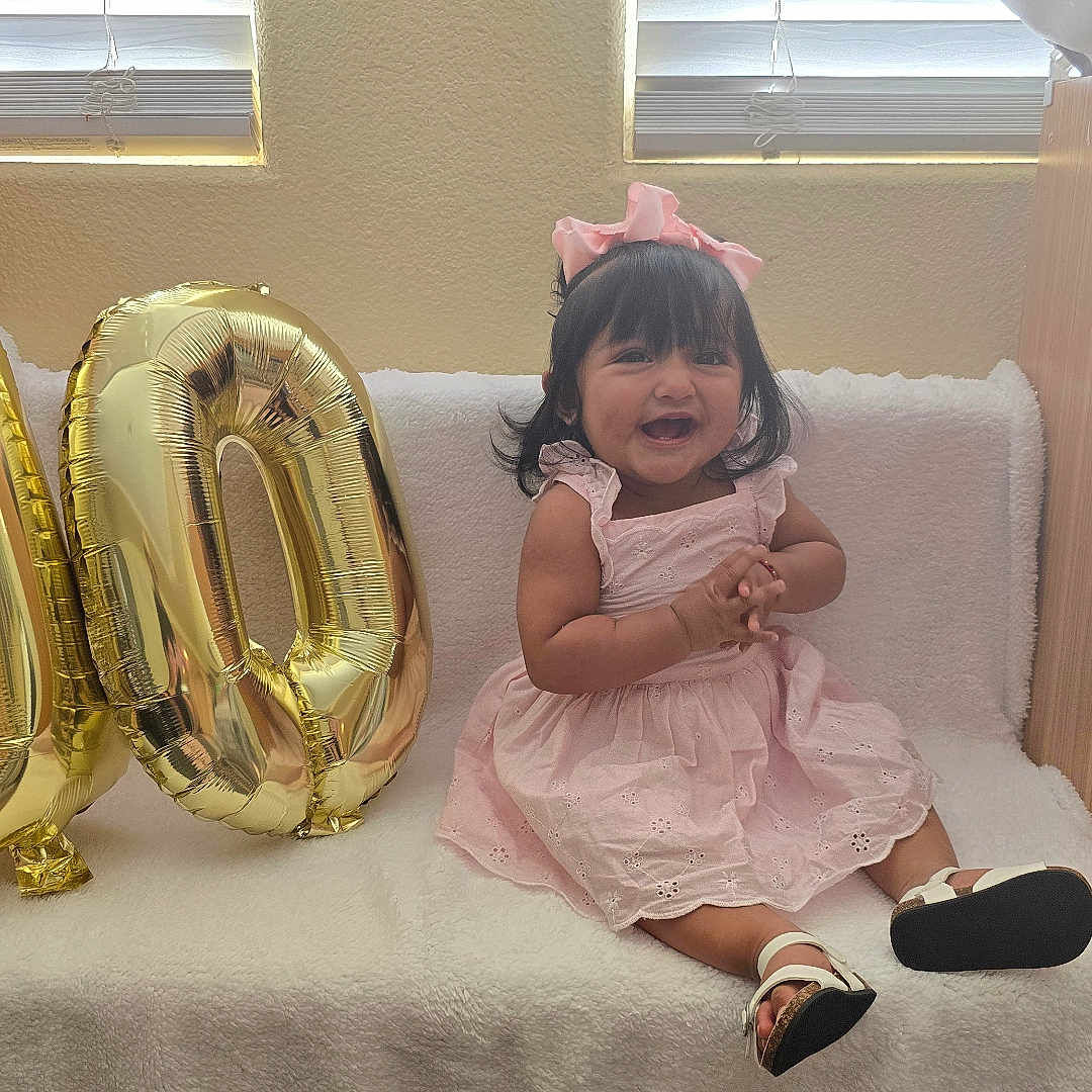 Angelina joined the competition — help win amazing prizes! blade, child, couch, face, female, furniture, girl, head, indoors, number, people, person, photography, portrait, razor, sitting, smokepipe, symbol, text, weapon