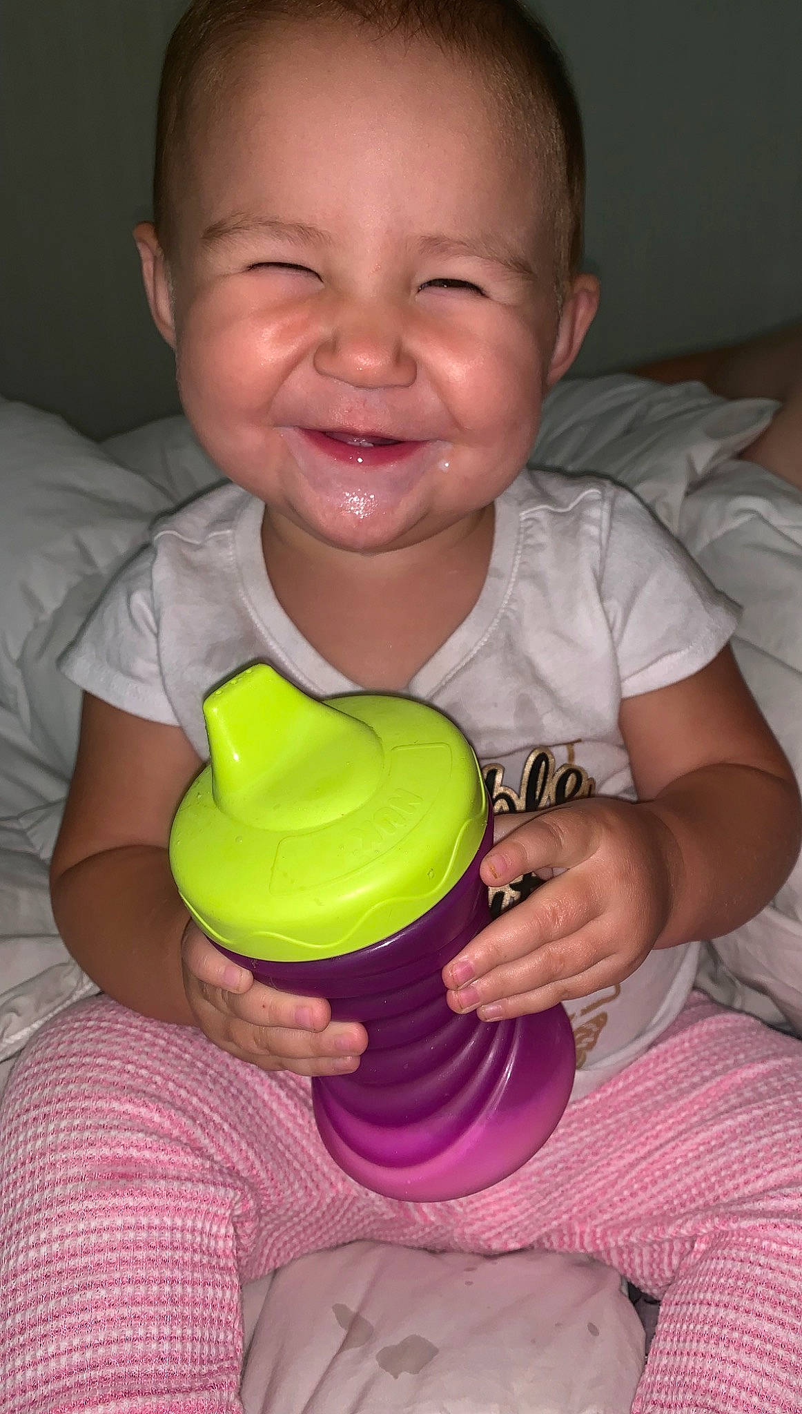 Maggie joined the competition — help win amazing prizes! baby, ball, child, eye, facial_expression, joy, lip, person, play, sitting, skin, smile, toddler