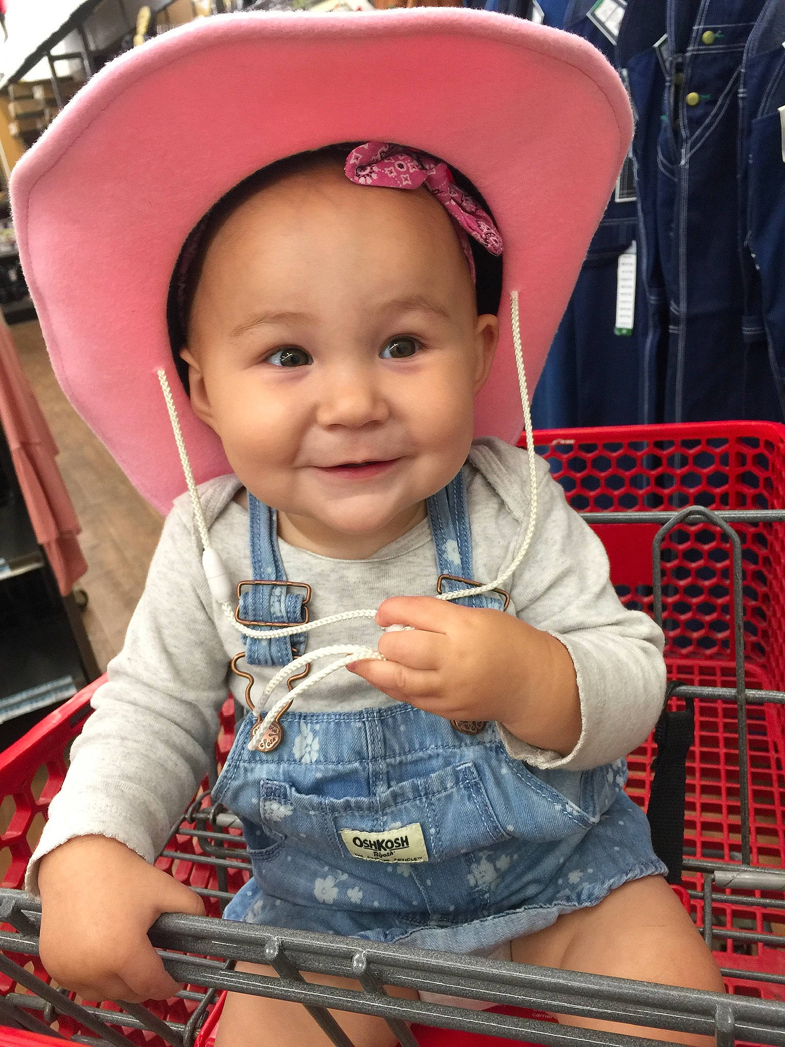 Maggie joined the competition — help win amazing prizes! baby, cheek, child, cowboy_hat, fashion_accessory, fun, hat, headgear, jeans, joy, people, person, product, sitting, skin, smile, sun_hat, toddler, vacation