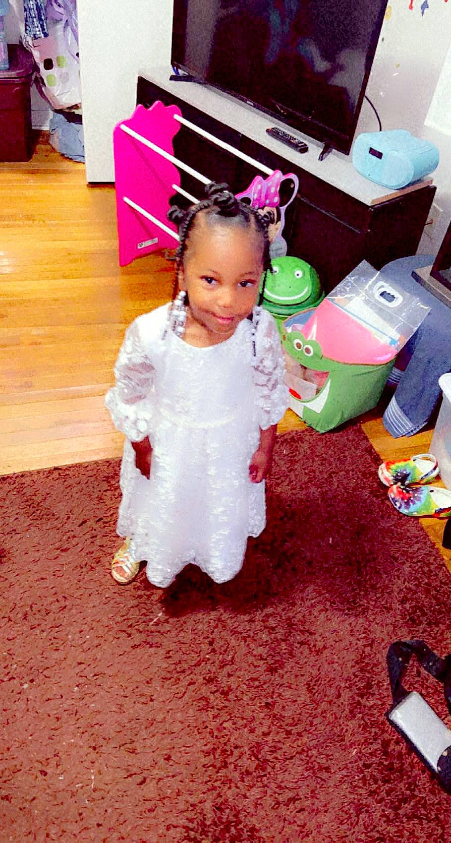 Miracle is registered to the contest to win money with this photo: baby, baby_toddler_clothing, bag, box, carton, child, event, floor, flooring, fun, happy, hardwood, joy, magenta, person, pink, room, shipping_box, sitting, sleeve