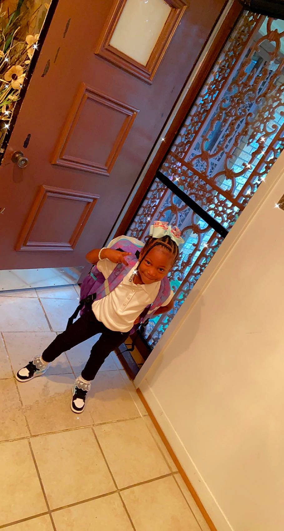 Miracle is registered to the contest to win money with this photo: boot, building, door, flooring, footwear, fun, hardwood, high_heels, human_leg, joy, knee, leg, leisure, person, room, sandal, sneakers, stairs, sunglasses, t_shirt