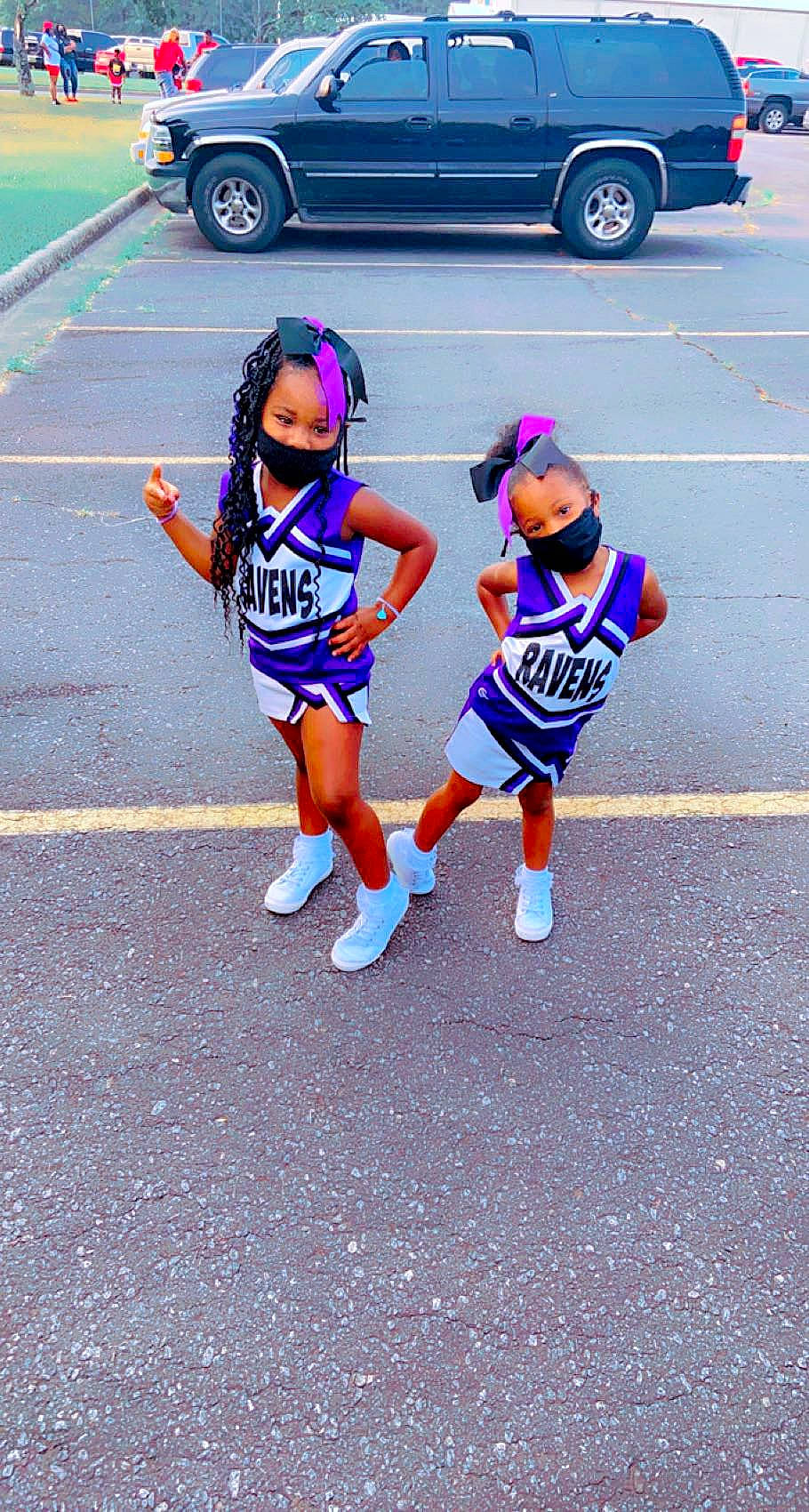 Miracle joined the competition — help win amazing prizes! asphalt, automotive_exterior, bumper, car, cheerleading, electric_blue, event, family_car, hat, human_leg, motor_vehicle, parking, pedestrian, person, road, sports, sports_uniform, sportswear, thigh, vehicle_door