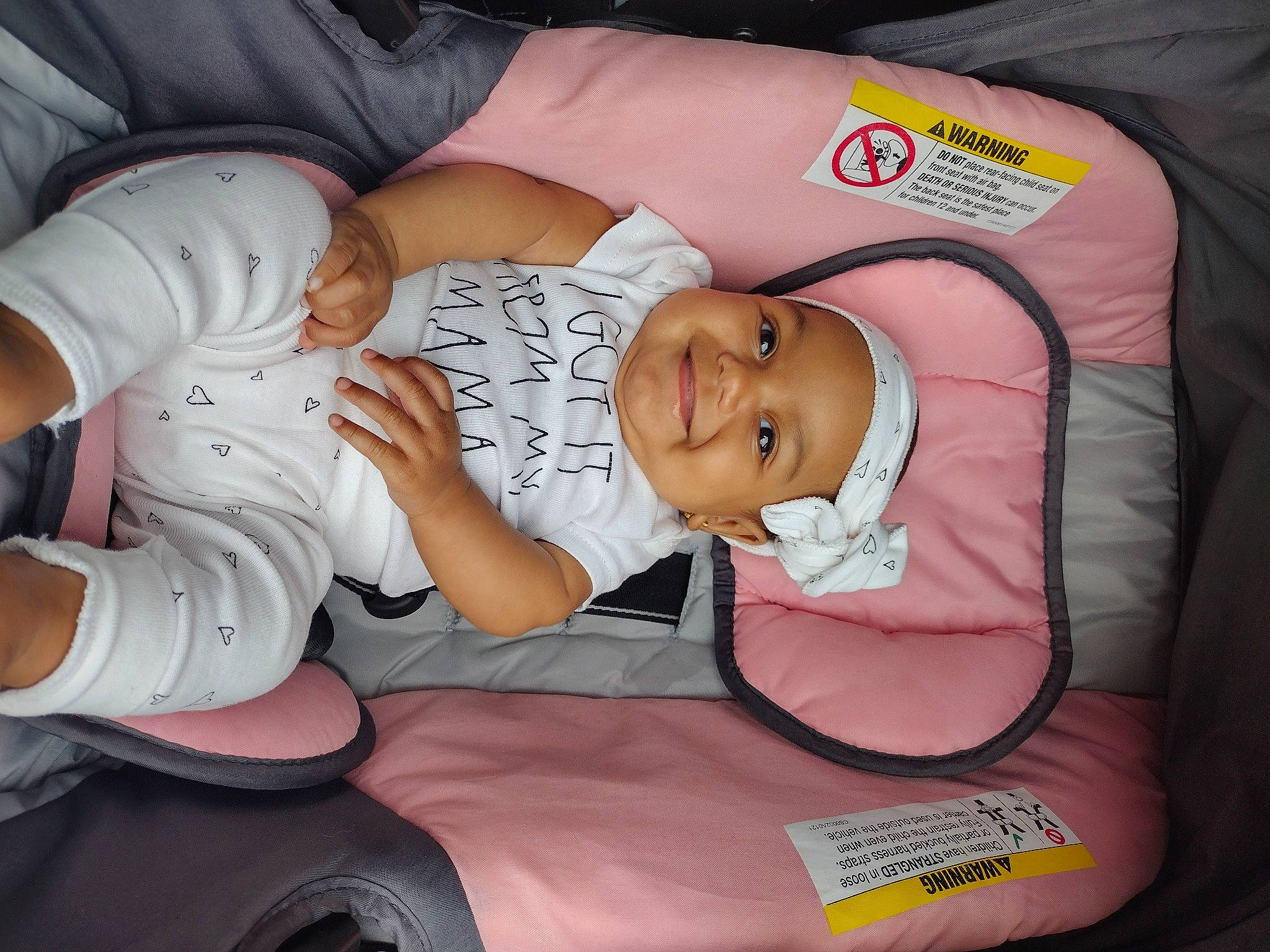 Isabella is registered to the contest to win money with this photo: baby, baby_products, baby_toddler_clothing, child, comfort, event, hat, headwear, joy, nail, pattern, person, sitting, toddler