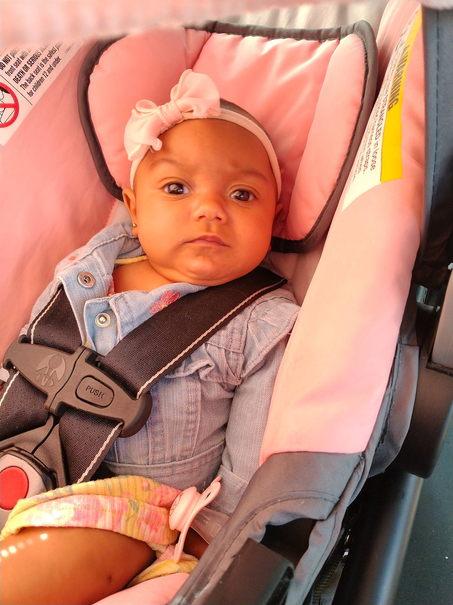 Isabella is registered to the contest to win money with this photo: auto_part, baby, baby_carriage, baby_products, baby_toddler_clothing, cap, car_seat, chair, cheek, child, comfort, fashion_accessory, fun, head, headwear, mouth, passenger, person, seat_belt, sitting