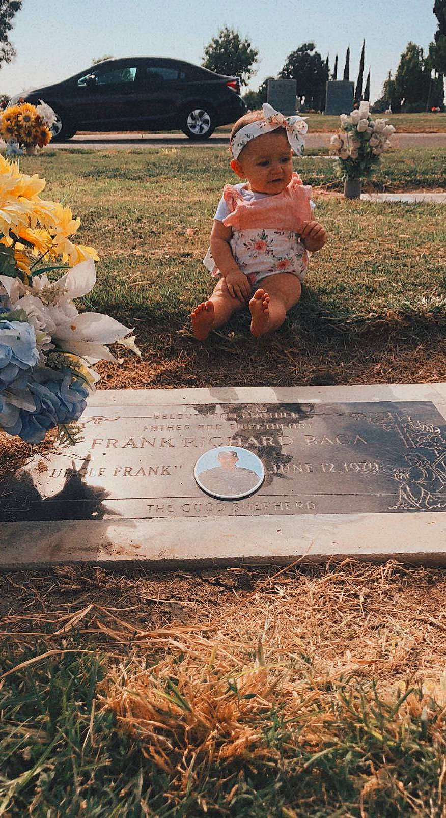 Serenity Rose is registered to the contest to win money with this photo: asphalt, automotive_tire, botany, family_car, grass, hat, landscape, lawn, leaf, light, natural_environment, nature, person, photograph, plant, soil, tire, toddler, tree, vehicle_door