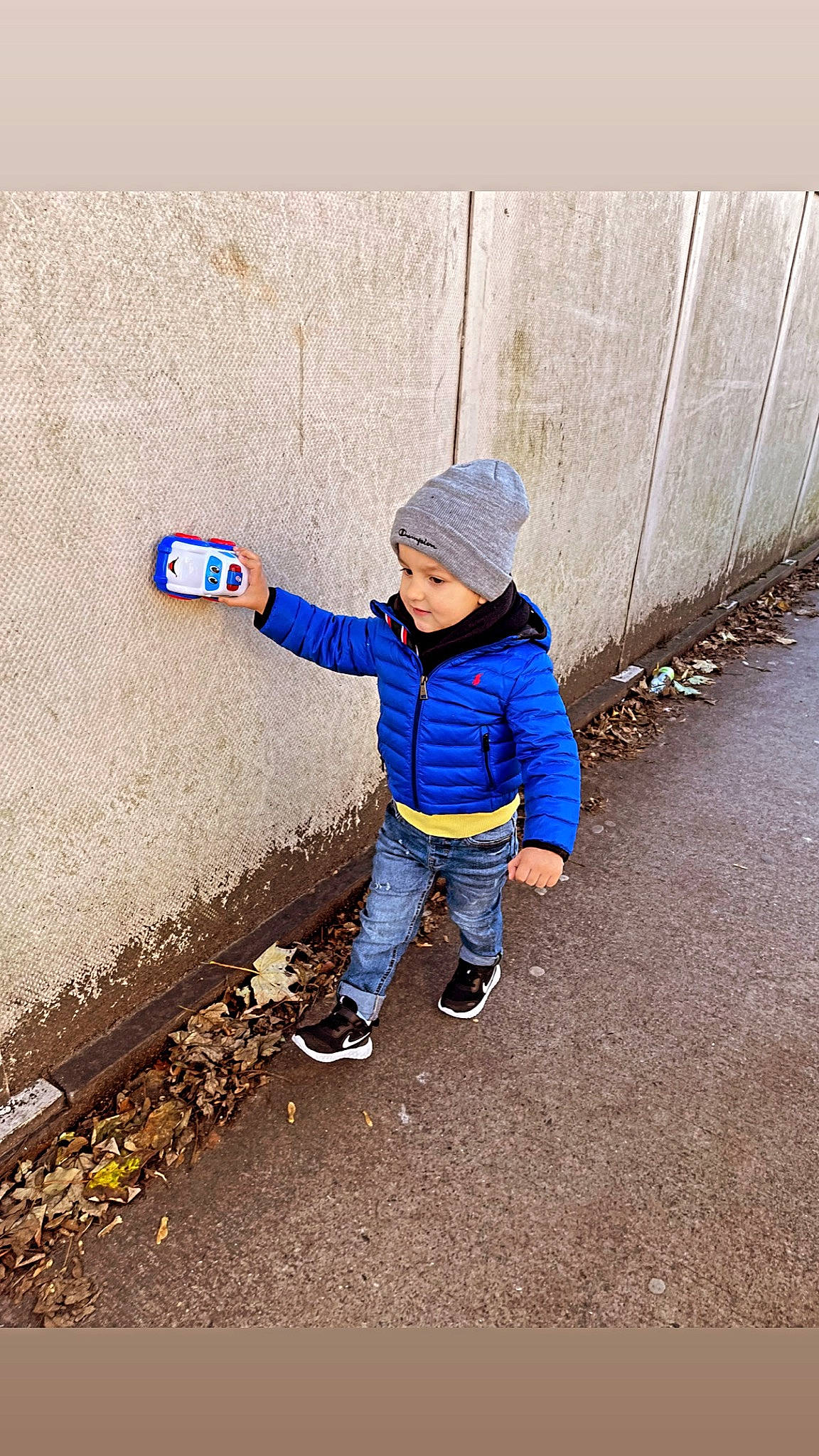 Matei is registered to the contest to win money with this photo: asphalt, boot, cap, child, concrete, denim, electric_blue, fun, hat, headwear, jacket, jeans, landscape, people_in_nature, person, road_surface, shadow, sidewalk, soil, tints_and_shades