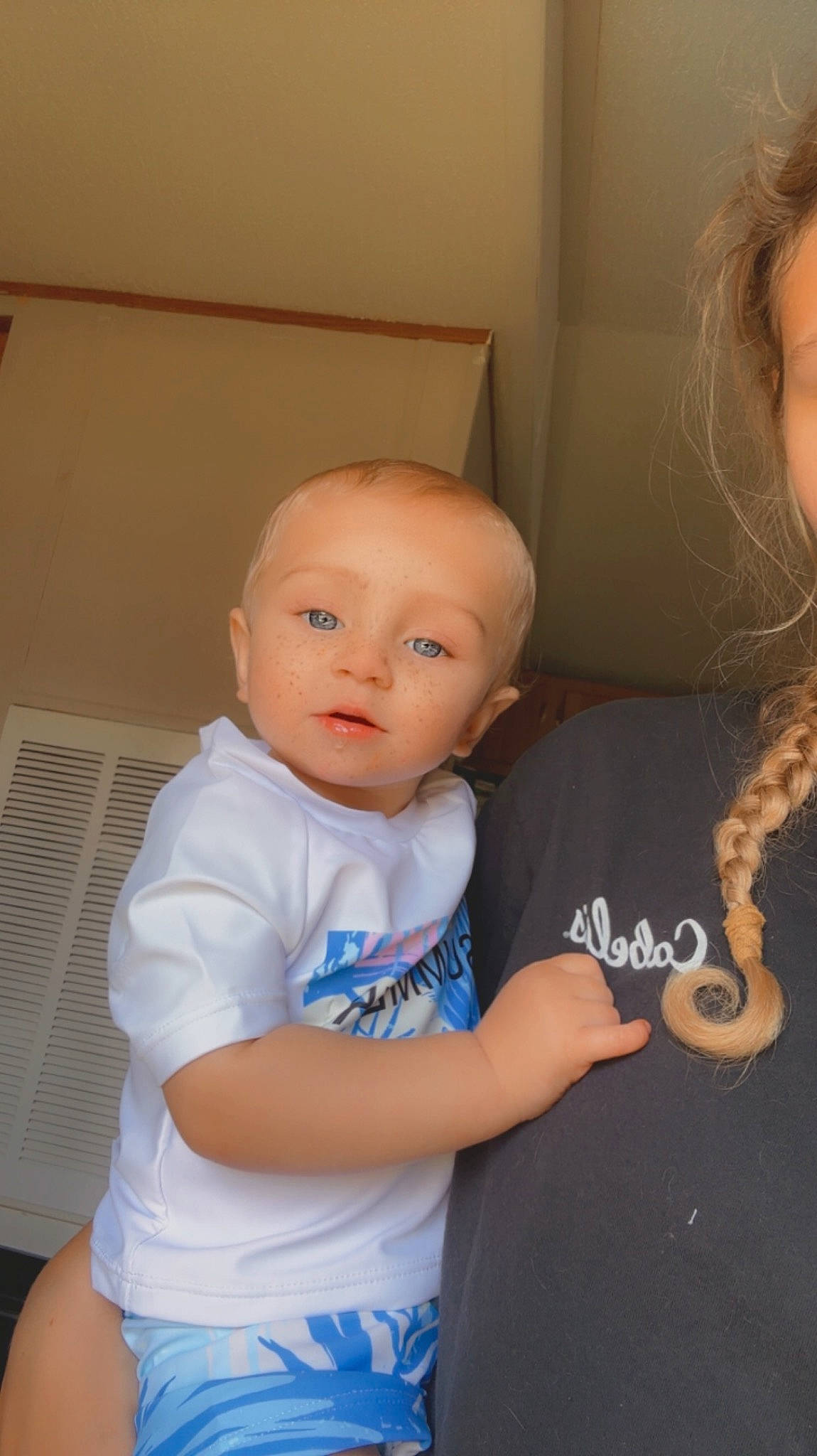 Braeden is registered to the contest to win money with this photo: arm, baby, baby_toddler_clothing, cheek, chest, chin, eyelash, fun, gesture, happy, human_body, iris, mouth, neck, nose, person, shoulder, skin, sleeve, t_shirt