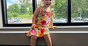 Wrenly joined the competition — help win amazing prizes! blue_sky, carpet, child, clogs, clouds, colorful_clothing, dress, fruit_pattern, happy, indoors, parking_lot, pink_shoes, portrait, smiling, sunlight, toddler, toy, trees, window, windowsill