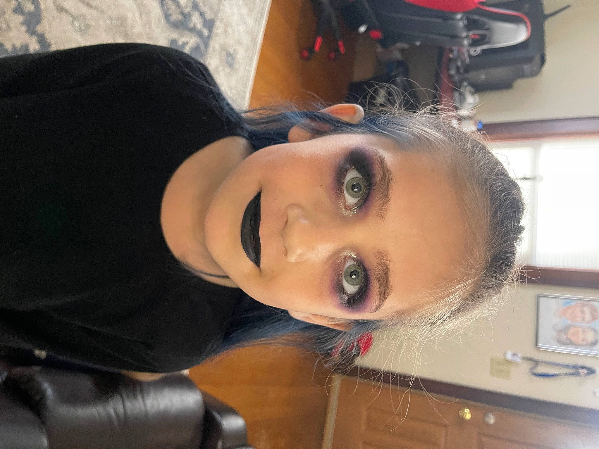 Mckenzie is registered to the contest to win money with this photo: audio_equipment, black_hair, chin, eyebrow, eyelash, eyewear, fashion_design, forehead, fun, lip, nose, person, personal_protective_equipment, selfie, smile