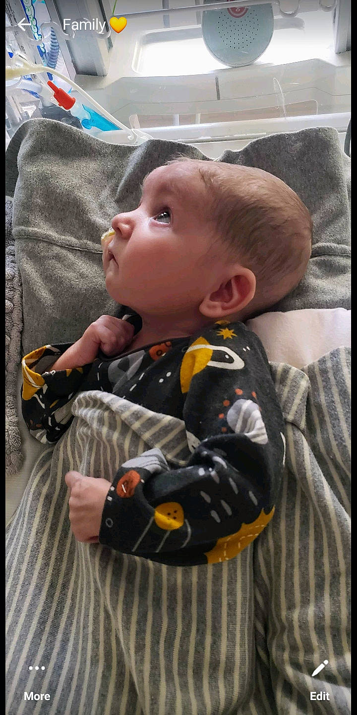 Jamison joined the competition — help win amazing prizes! baby, baby_products, baby_safety, baby_toddler_clothing, cheek, child, clothing, comfort, linens, orange, pattern, person, plant, play, product, room, sitting, sleeve, toddler, tree