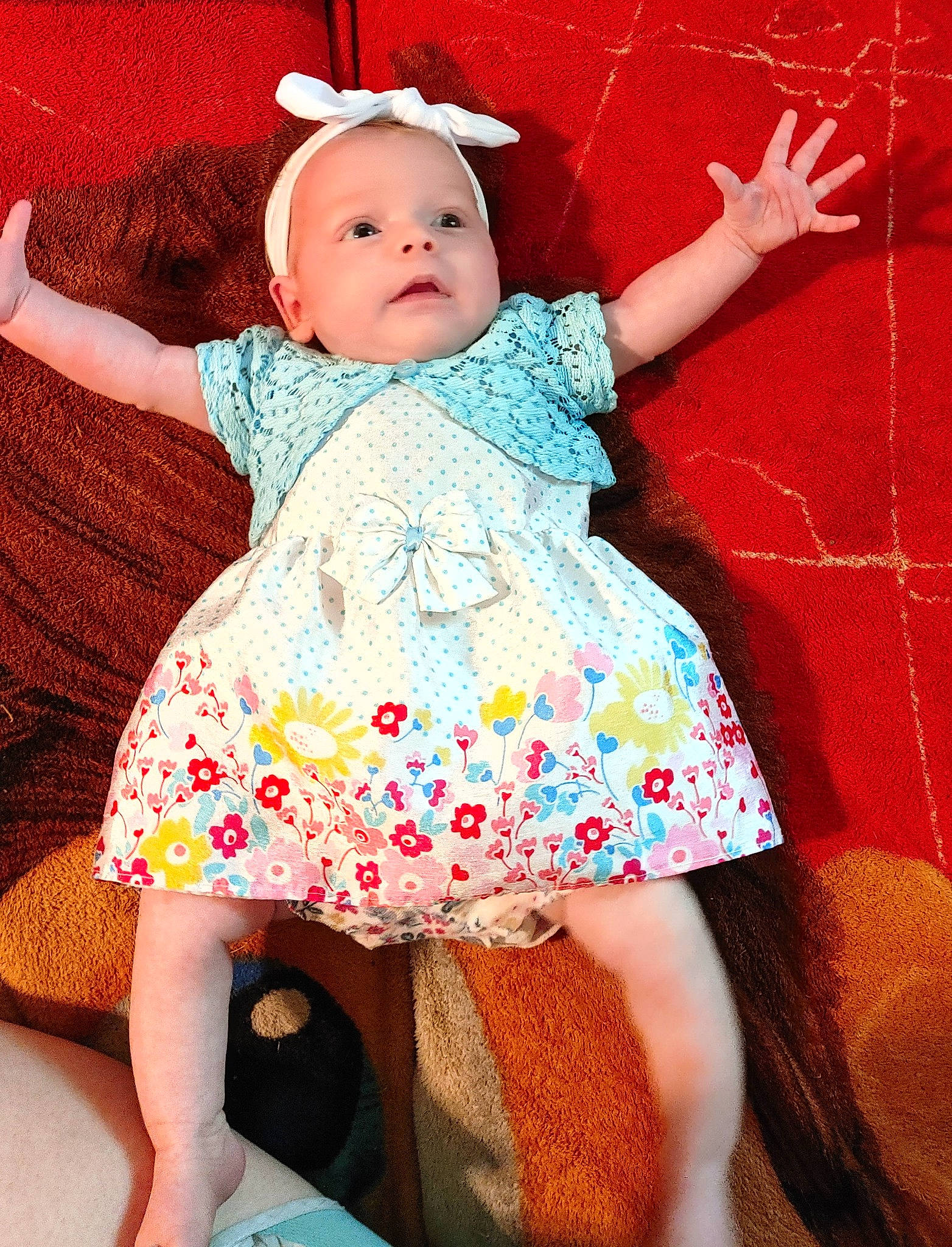 Isabeau joined the competition — help win amazing prizes! baby, baby_toddler_clothing, child, day_dress, dress, fun, happy, headgear, human_leg, magenta, one_piece_garment, pattern, person, pink, purple, red, skin, sleeve, textile, thigh