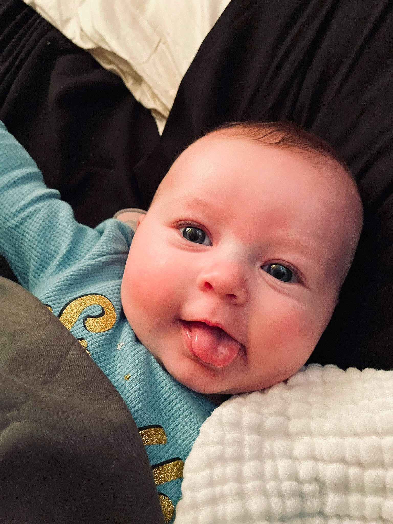 Kora joined the competition — help win amazing prizes! baby, baby_toddler_clothing, cheek, child, comfort, face, facial_expression, finger, gesture, happy, lip, mouth, nose, outerwear, person, skin, sleeve, smile, textile, thumb