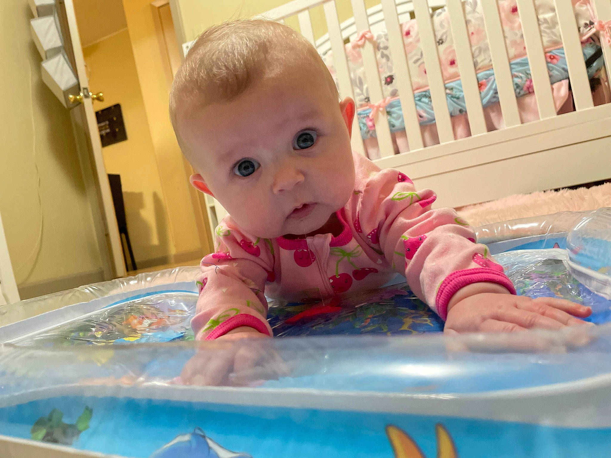 Kora joined the competition — help win amazing prizes! baby, baby_grabbing_for_something, baby_playing_with_toys, baby_products, baby_toddler_clothing, baby_toys, bathing, cheek, child, crawling, flooring, fun, leisure, person, pink, play, product, room, sitting, sleeve