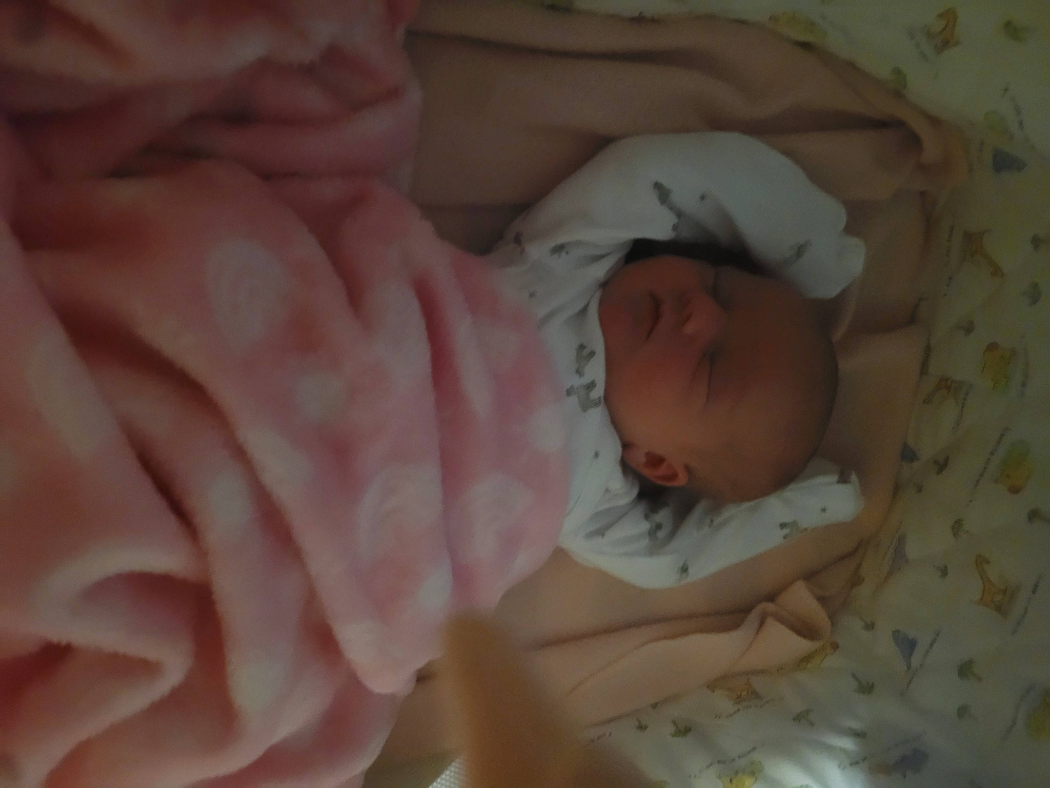 Kylee is registered to the contest to win money with this photo: baby, baby_products, baby_safety, baby_sleeping, baby_toddler_clothing, bed, bedtime, child, comfort, finger, gesture, human_body, infant_bed, linens, nail, person, product, room, skin, thumb