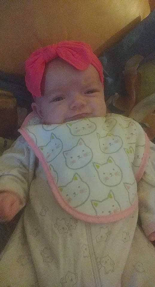 Anna joined the competition — help win amazing prizes! baby, baby_products, baby_toddler_clothing, bib, cap, cheek, chest, comfort, eye, eyebrow, happy, headwear, human_body, lip, mouth, nose, person, pink, skin, sleeve