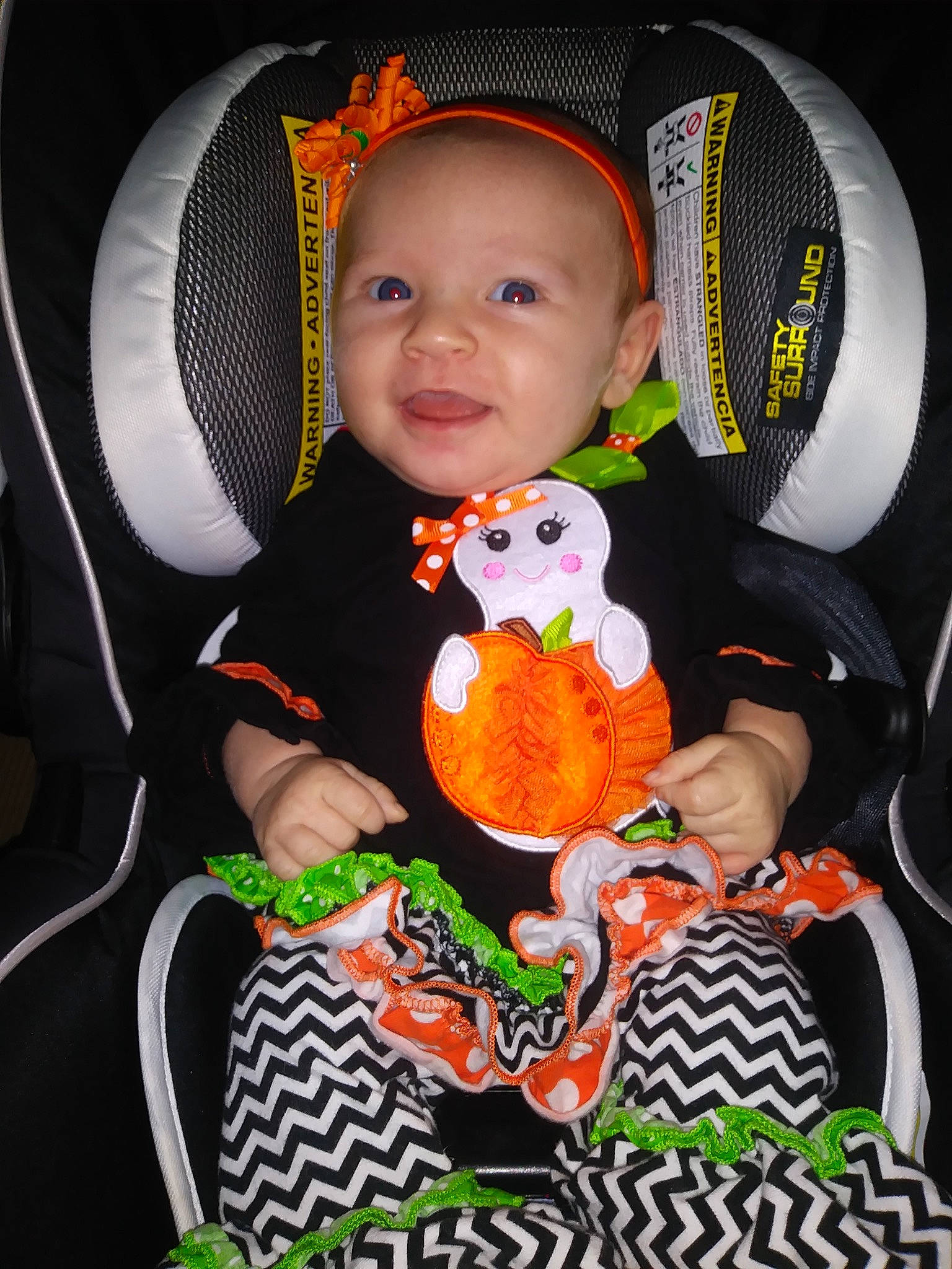 Stevie Rose joined the competition — help win amazing prizes! baby_products, car_seat, child, fun, halloween, headgear, infant, person, product, smile, toddler