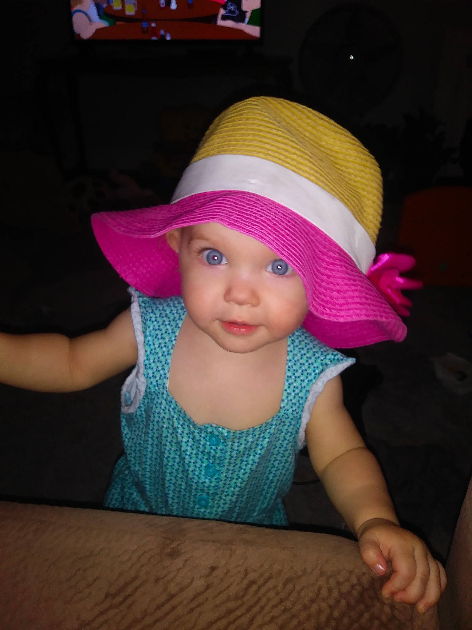 Lily Vaughn is registered to the contest to win money with this photo: beanie, cap, child, fashion_accessory, fun, girl, hat, headgear, headwear, infant, knit_cap, magenta, party_hat, person, pink, product, sun_hat, textile, toddler