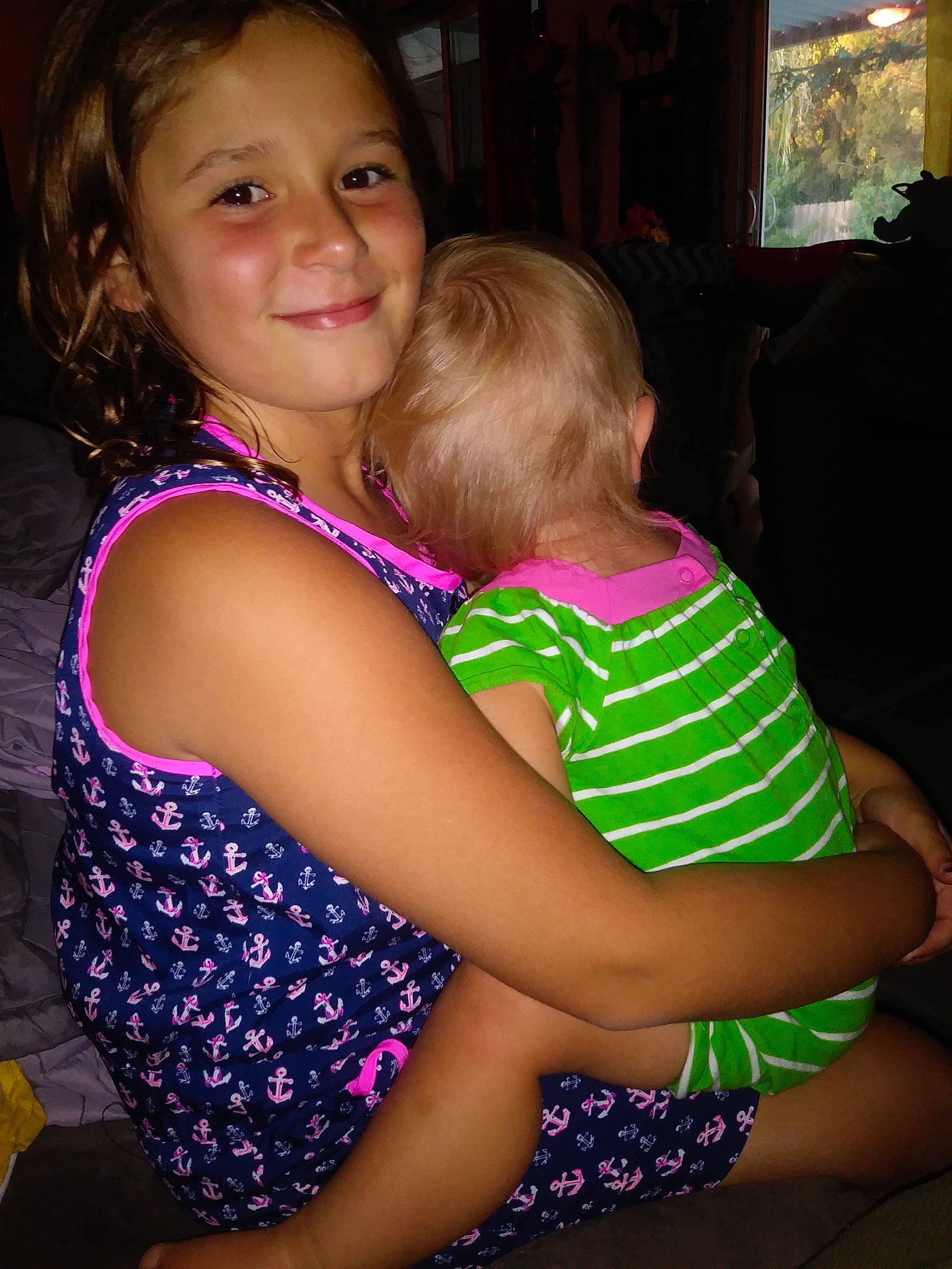 Aurora Jayne is registered to the contest to win money with this photo: beauty, cheek, child, day, emotion, eye, facial_expression, fun, girl, hair, human_hair_color, joy, leg, person, pink, purple, shoulder, sitting, skin, smile