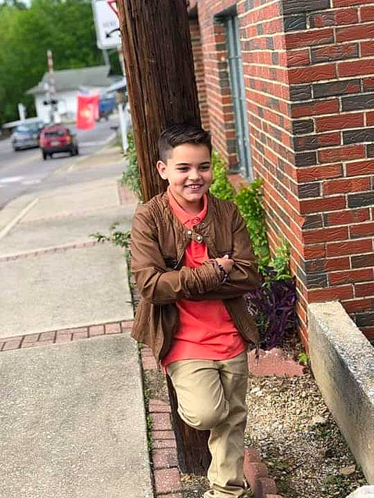 Roque joined the competition — help win amazing prizes! jacket, jeans, joy, outerwear, person, photography, plant, smile, snapshot, temple