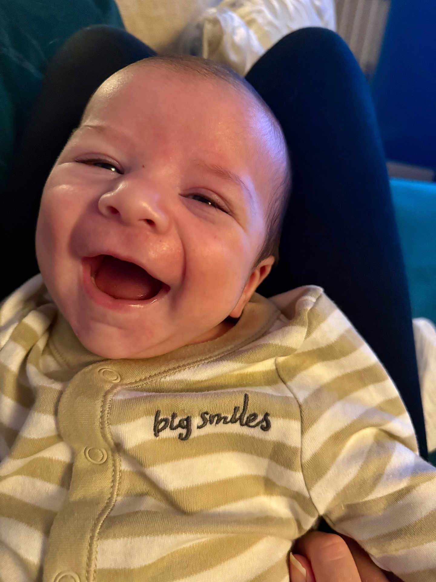 Dylan joined the competition — help win amazing prizes! baby, smiling, laughing, onesie, striped_clothing, person_holding, indoor, closeup, happy, infant, child, cute, face, human, portrait, baby_clothes, hand, joy, comfort, warmth