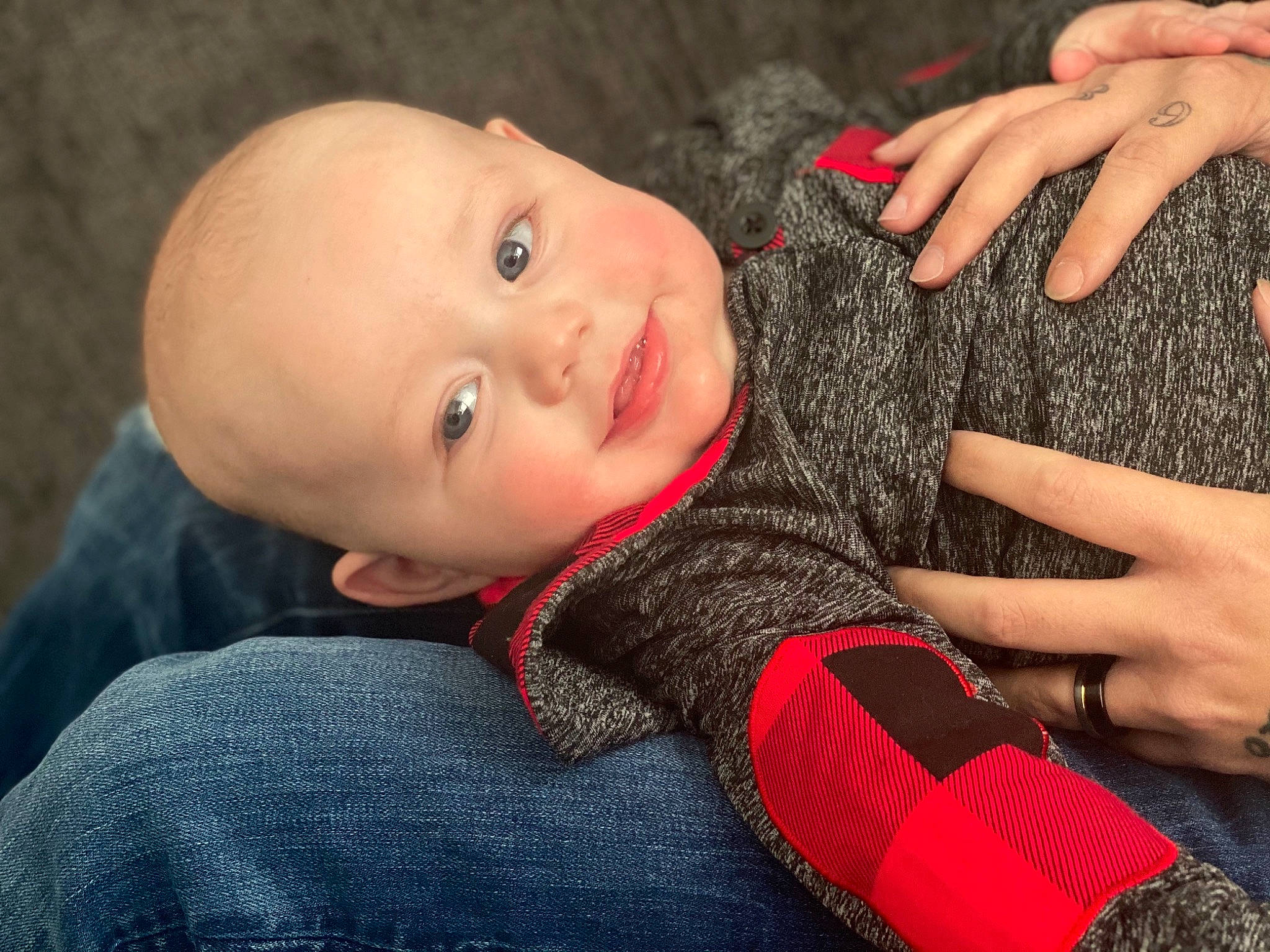 Axton joined the competition — help win amazing prizes! baby, baby_toddler_clothing, cheek, child, comfort, finger, gesture, hand, happy, leg, lip, nail, nose, outerwear, person, skin, sleeve, smile, textile, thumb