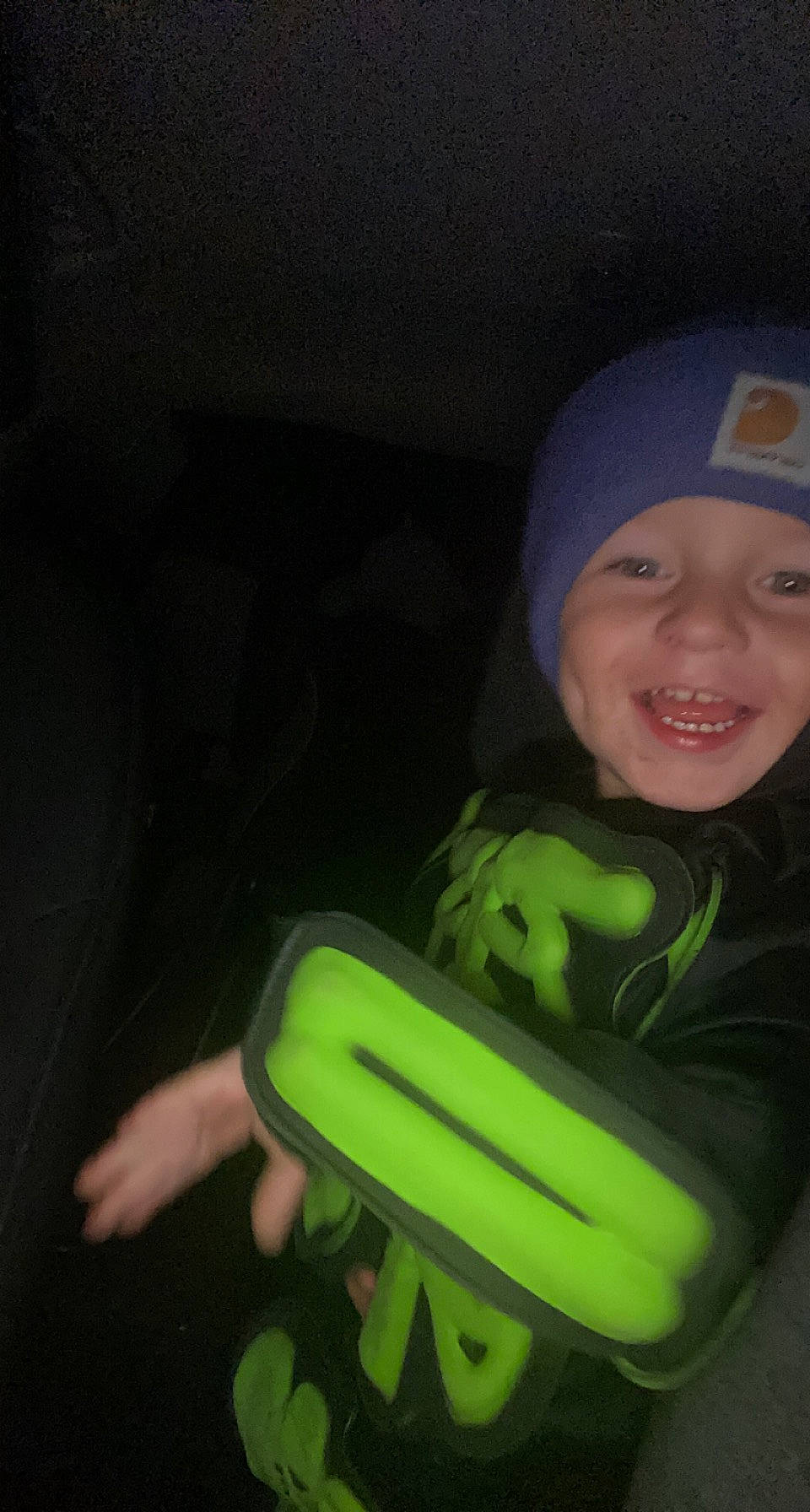 Hayden is registered to the contest to win money with this photo: auto_part, automotive_exterior, automotive_lighting, baseball_cap, bumper, cap, car_seat, electric_blue, flash_photography, fun, happy, headgear, headwear, jaw, joy, person, personal_protective_equipment, sitting, sleeve, smile