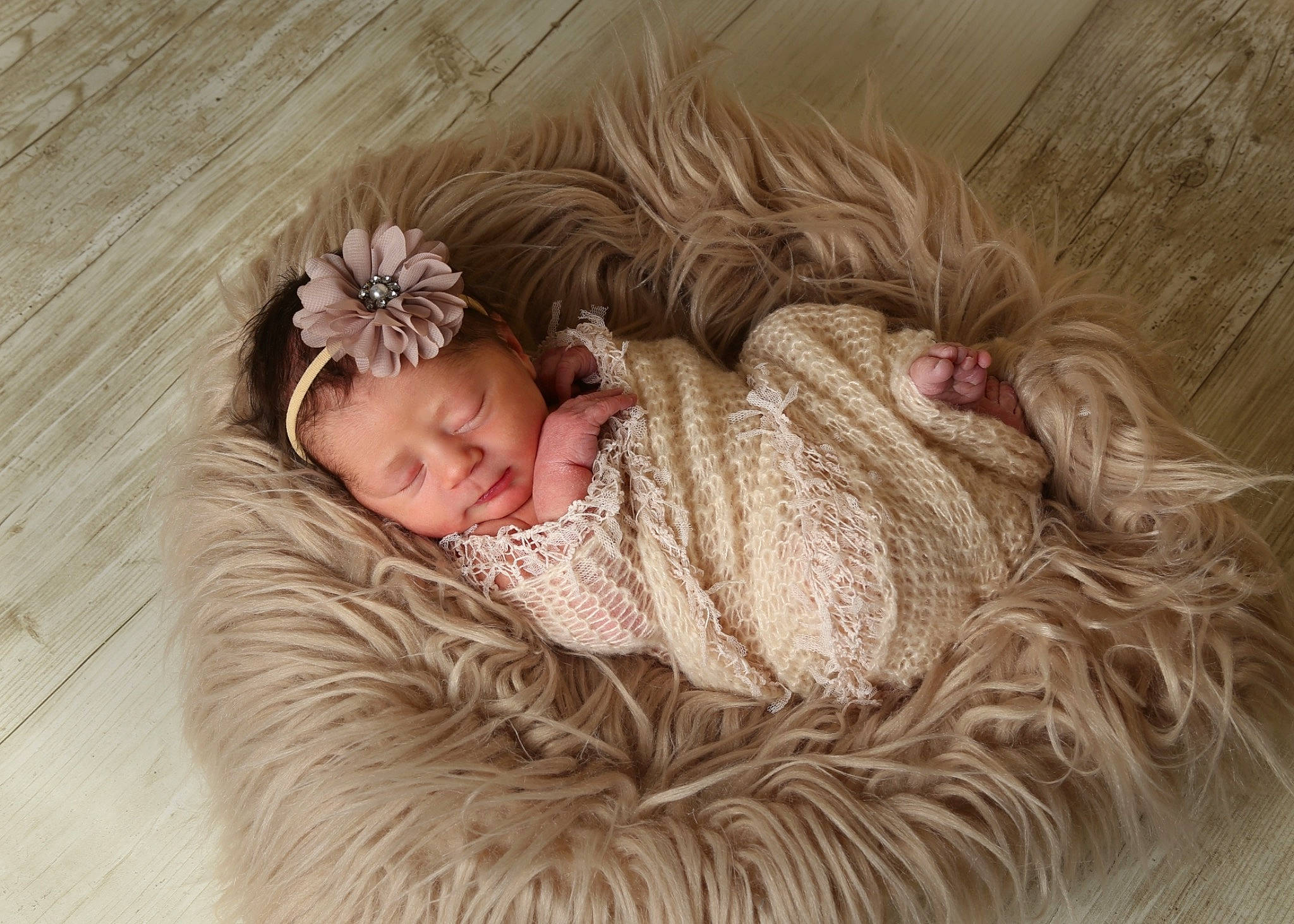 Rori is registered to the contest to win money with this photo: art, baby, baby_toddler_clothing, child, comfort, face, fashion_accessory, fur, headgear, linens, outerwear, pattern, person, portrait_photography, sitting, skin, sleeve, toddler, winter, wood