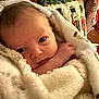 Effie joined the competition — help win amazing prizes! newborn, baby, blanket, soft, cozy, face, eyes, hand, couch, pillow, nutcracker, holiday, indoor, portrait, wrapped, infant, warm, cute, child, resting