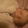 Miley is registered to the contest to win money with this photo: adorable, baby, child, closeup, cozy, cuteness, face, fur_coat, headband, indoor, infant, peaceful, pink_background, portrait, quiet, resting, sleeping, soft_texture, warm, young